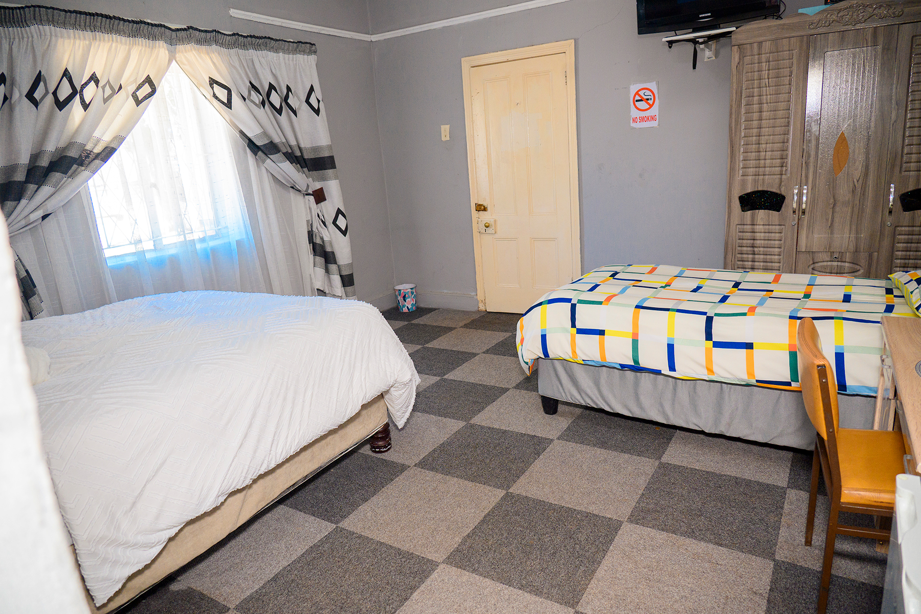 Deluxe guest bedroom at Maposa Legacy