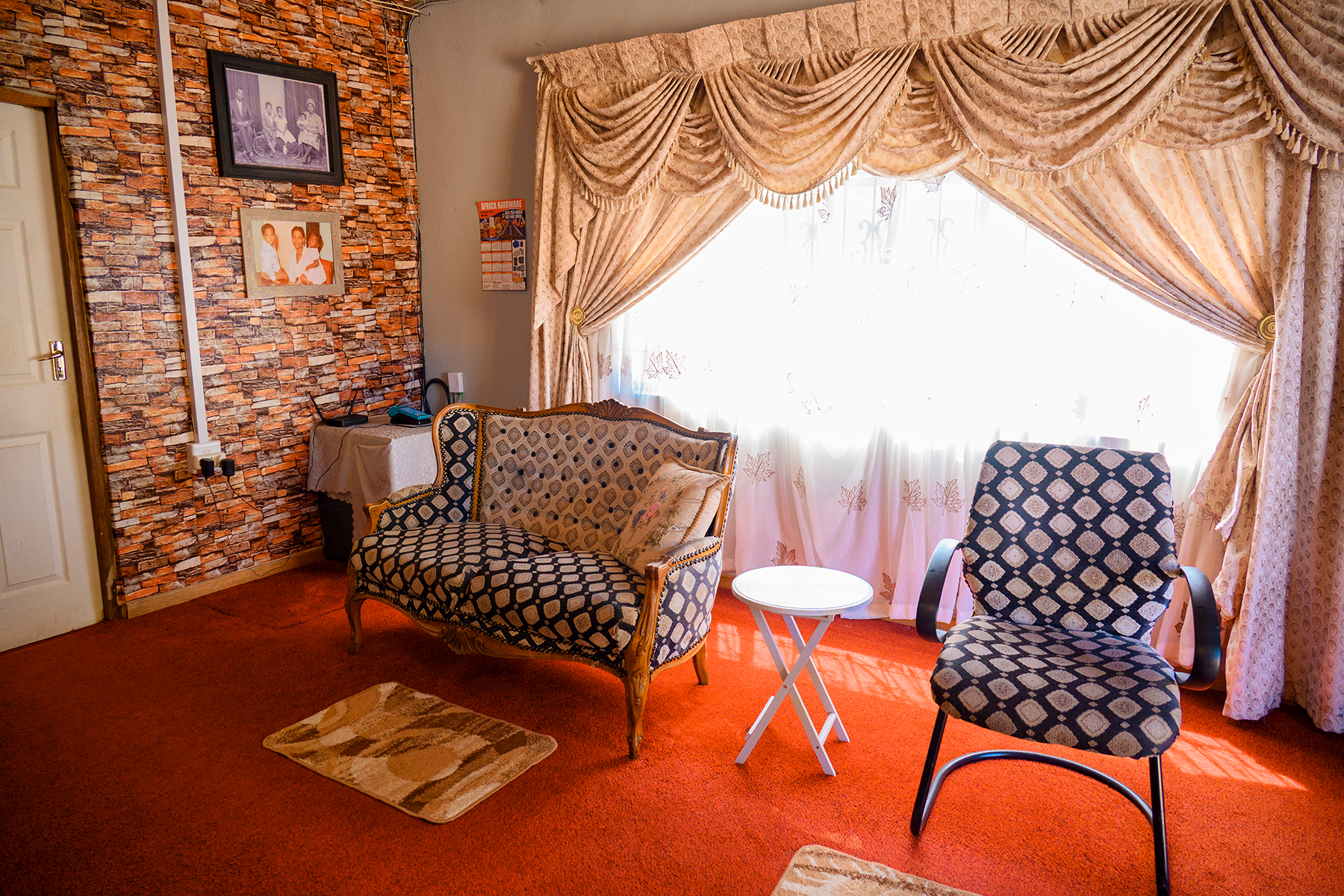 BDC Maposa Legacy brand artwork inside a premium lounge setting